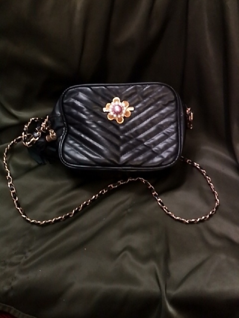 Hand Crafted Black Quilted Crossbody with Floral Emblem